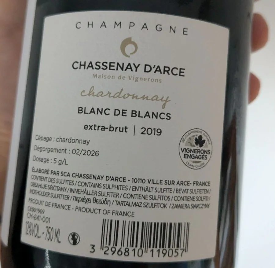 Contre-étiquette du Champagne Chassenay d'Arce Chardonnay 2019 indiquant le dégorgement de février 2026 et le dosage de 5 g/L